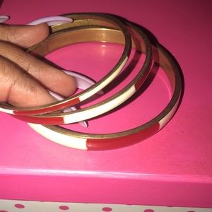 Red and white bangle bracelets